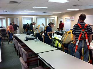 Donning Harnesses in Fall Protection class 